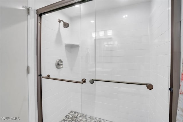 bathroom featuring walk in shower