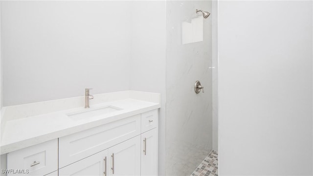 bathroom featuring vanity and walk in shower