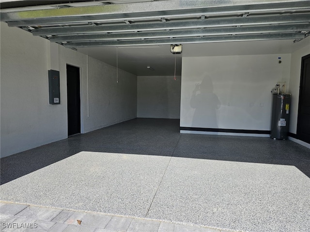 garage featuring electric panel, a garage door opener, and water heater