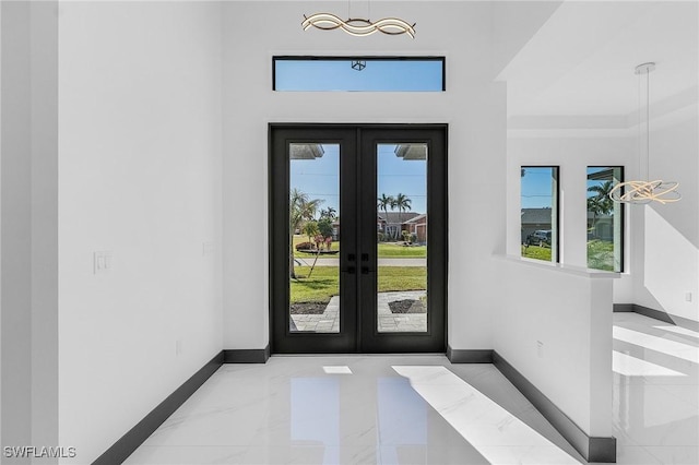 2123 SW 52nd Ter, Cape Coral, FL 33914 - foyer with french doors and marble finish flooring