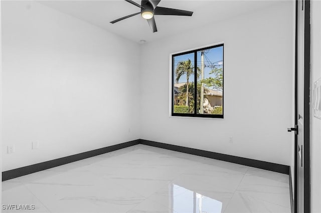 2123 SW 52nd Ter, Cape Coral, FL 33914 - unfurnished room with light marble finish flooring and ceiling fan