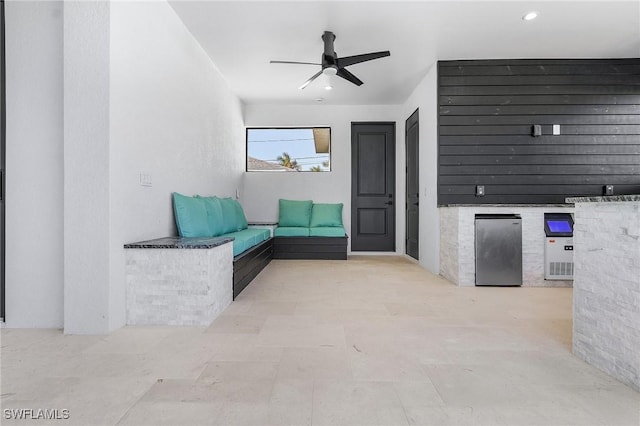 unfurnished room featuring ceiling fan