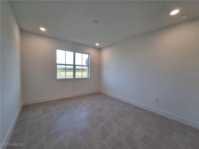 view of tiled spare room