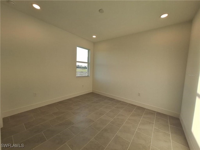 view of tiled spare room