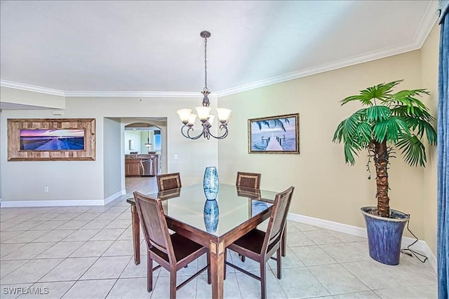 dining room featuring crown molding, light tile patterned flooring, and a chandelier