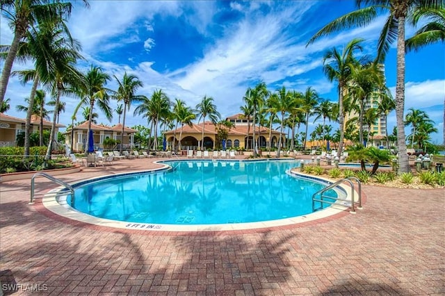 view of pool featuring a patio area