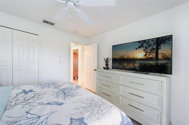 bedroom featuring a closet and ceiling fan