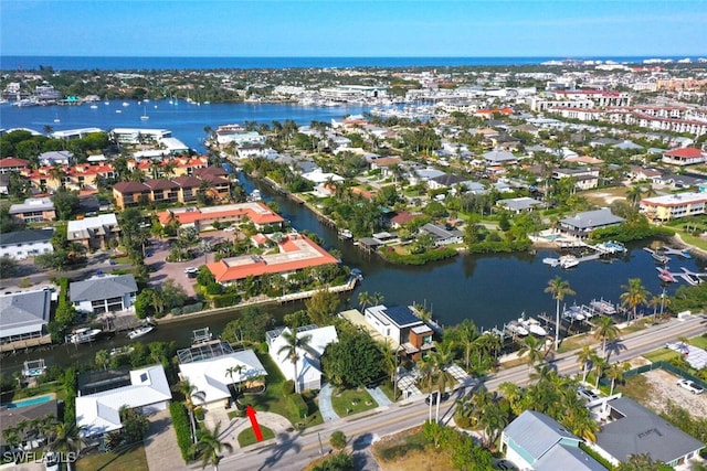 drone / aerial view featuring a water view