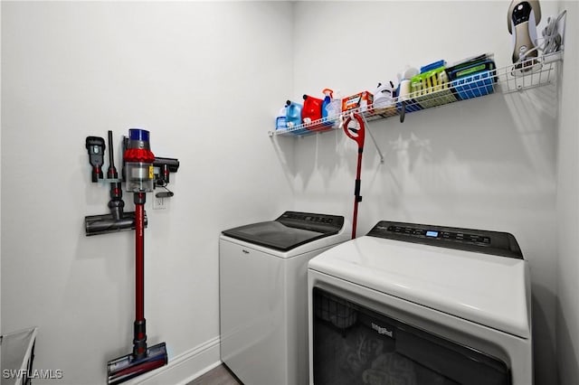 laundry room with independent washer and dryer