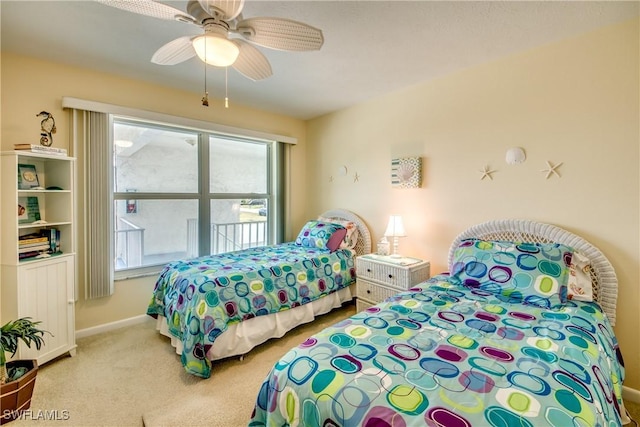 bedroom featuring light carpet, ceiling fan, and baseboards