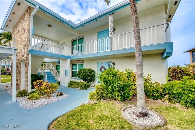 4026 SE 12th Ave Unit 208, Cape Coral, FL 33904 - view of community with stairway