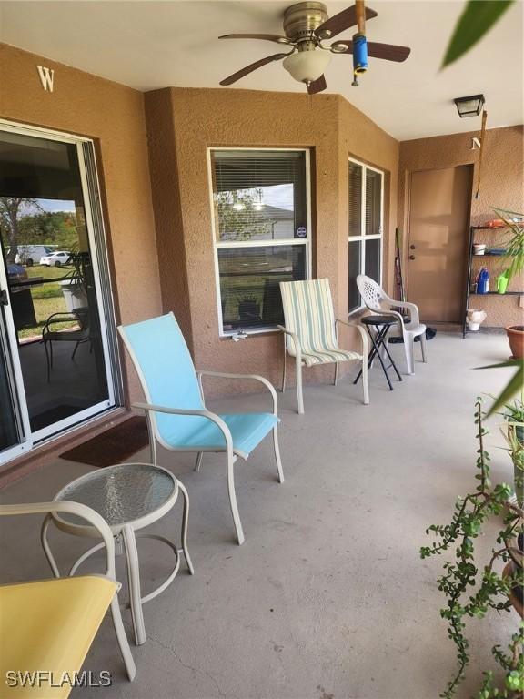 view of patio with ceiling fan