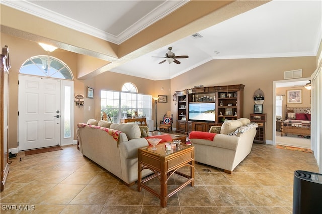 tiled living room with ceiling fan, lofted ceiling, and ornamental molding