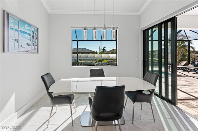 dining area with crown molding