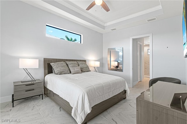 bedroom featuring ceiling fan, a raised ceiling, and crown molding