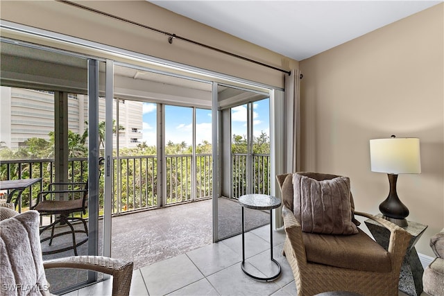 1 Bluebill Ave Unit 409, Naples, FL 34108 - living area featuring light tile patterned flooring