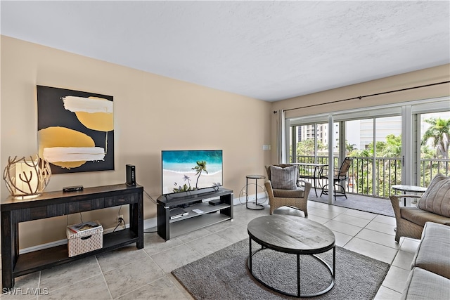 tiled living room with a textured ceiling