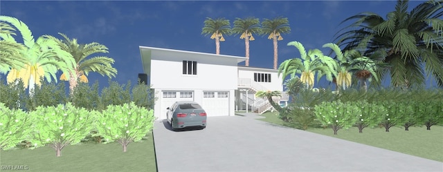 view of front facade featuring stucco siding, an attached garage, driveway, and stairway