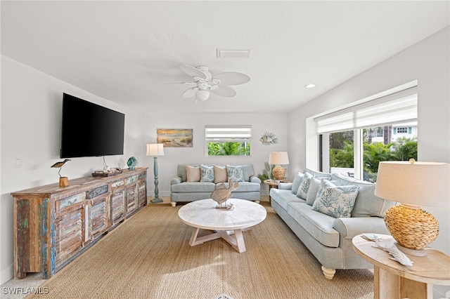 living room featuring ceiling fan