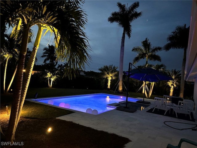 outdoor pool with a patio