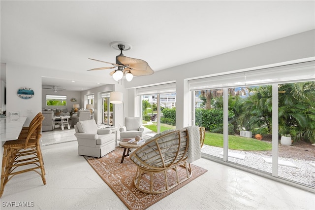 living room featuring ceiling fan