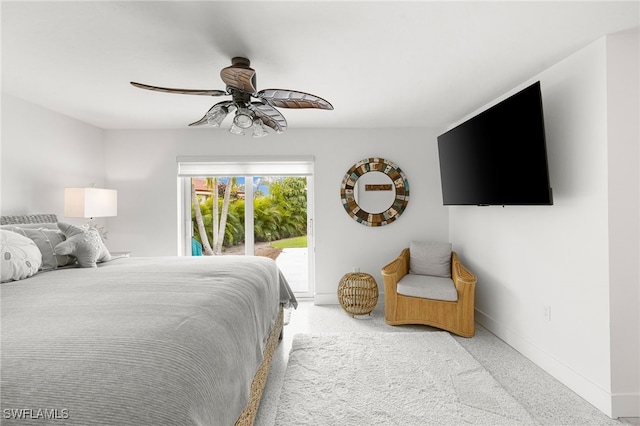 bedroom featuring carpet, ceiling fan, and access to outside