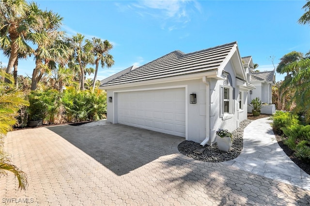 view of home's exterior featuring a garage