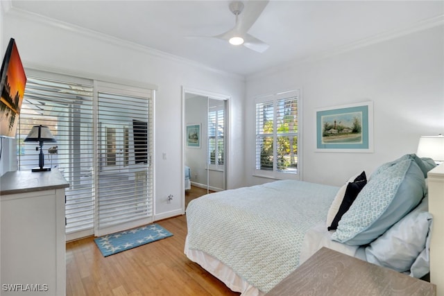 bedroom with ceiling fan, light hardwood / wood-style flooring, and crown molding