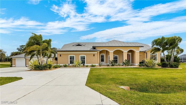 view of front of home featuring covered porch and a front yard