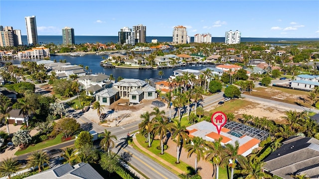 bird's eye view with a water view