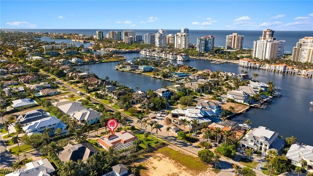 drone / aerial view with a water view