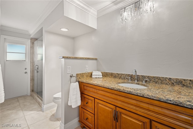 bathroom with crown molding, tile patterned flooring, vanity, an enclosed shower, and toilet