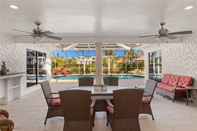 exterior space featuring a swimming pool and ceiling fan