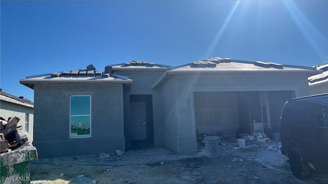 view of front of home with a garage