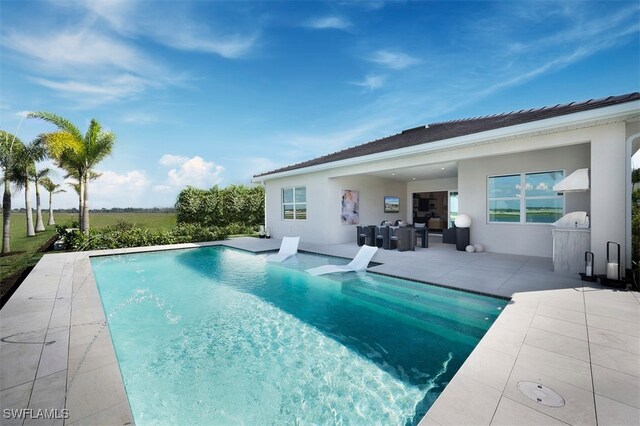 view of pool featuring a patio