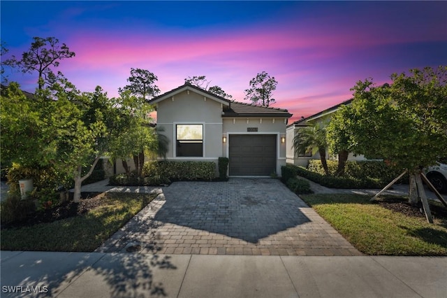 view of front of property featuring a garage