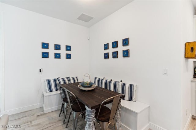 dining area featuring light hardwood / wood-style flooring