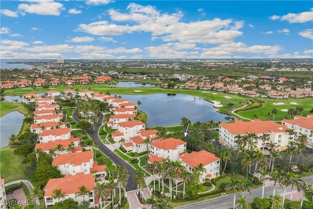 drone / aerial view with a water view