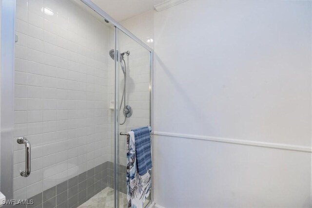 bathroom with a stall shower