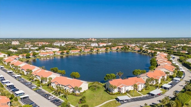 bird's eye view with a residential view and a water view