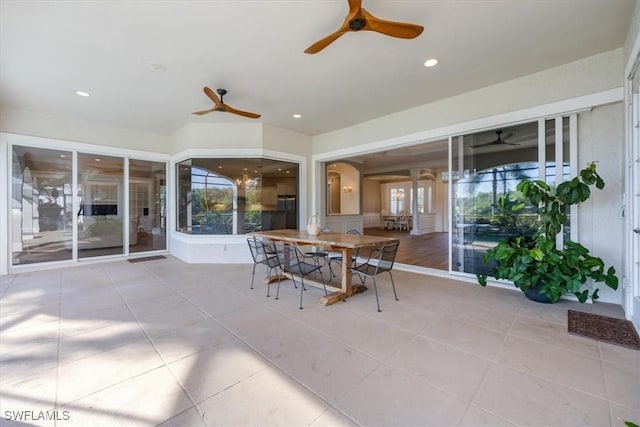 interior space featuring ceiling fan