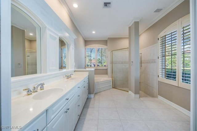 bathroom featuring tile patterned floors, vanity, independent shower and bath, and ornamental molding