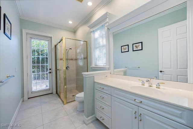 bathroom with vanity, crown molding, tile patterned flooring, toilet, and walk in shower