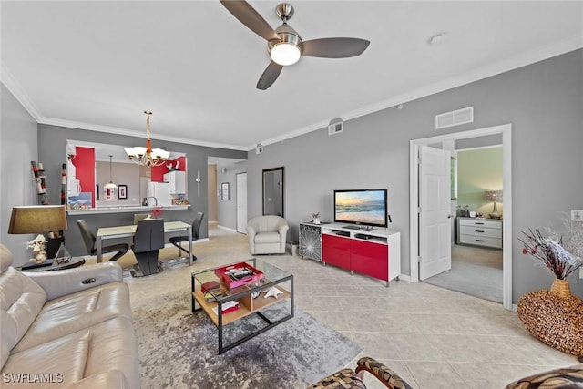 tiled living room featuring ceiling fan with notable chandelier and crown molding