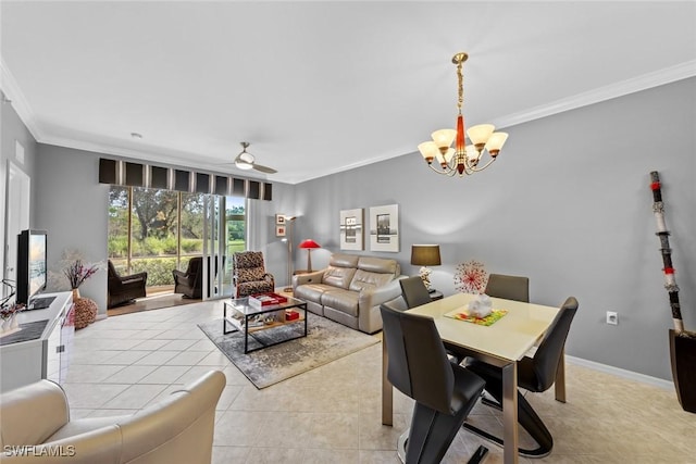 dining space with ceiling fan with notable chandelier, light tile patterned flooring, and ornamental molding