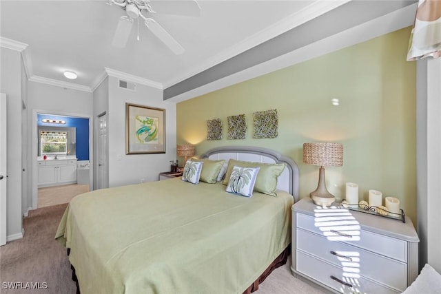 carpeted bedroom with ceiling fan, crown molding, and ensuite bath