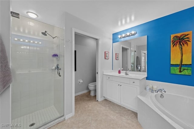 full bathroom with tile patterned flooring, shower with separate bathtub, vanity, and toilet