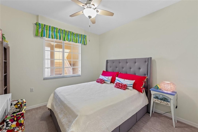 bedroom with ceiling fan and carpet floors