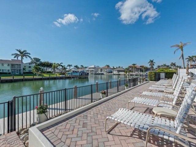 view of patio / terrace with a water view