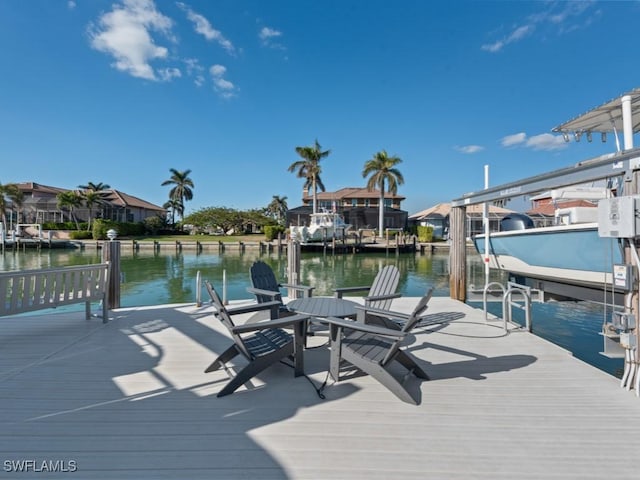 dock area with a water view